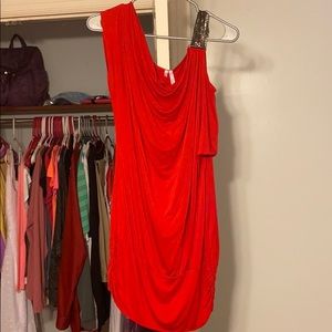 One exposed shoulder with chain link detail top!